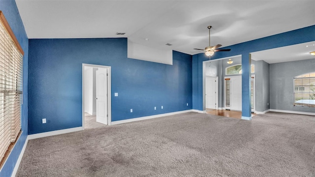 1156 Normandy Heights Cir, Winter Haven, FL 33880 - unfurnished bedroom with vaulted ceiling, carpet flooring, and a ceiling fan