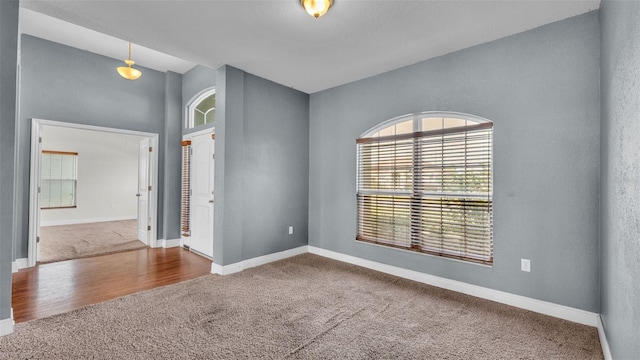 1156 Normandy Heights Cir, Winter Haven, FL 33880 - empty room featuring carpet flooring and baseboards
