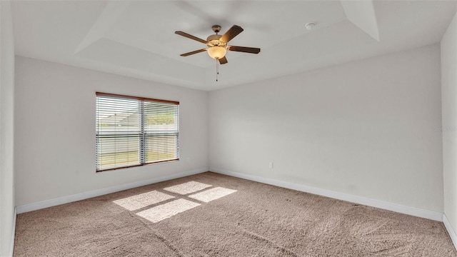 1156 Normandy Heights Cir, Winter Haven, FL 33880 - carpeted empty room with a raised ceiling, ceiling fan, and a smoke detector