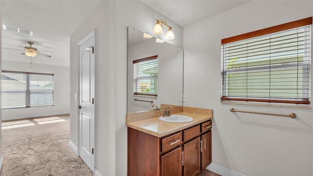 1156 Normandy Heights Cir, Winter Haven, FL 33880 - bathroom with vanity, plenty of natural light, and ceiling fan