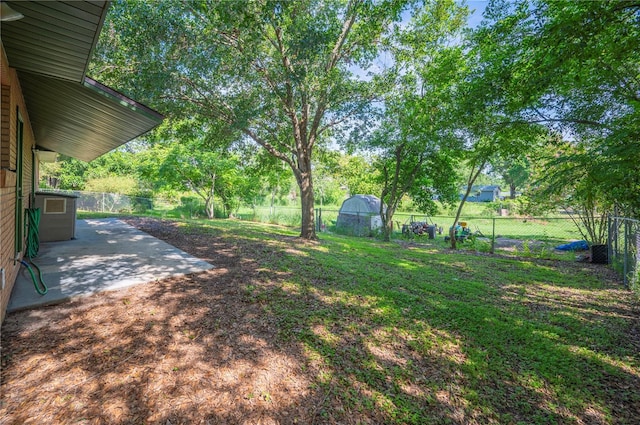 335 W Cummings St, Lake Alfred, FL 33850 - fenced backyard featuring a patio