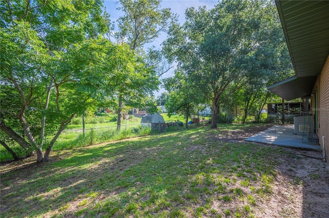 335 W Cummings St, Lake Alfred, FL 33850 - fenced backyard with a patio