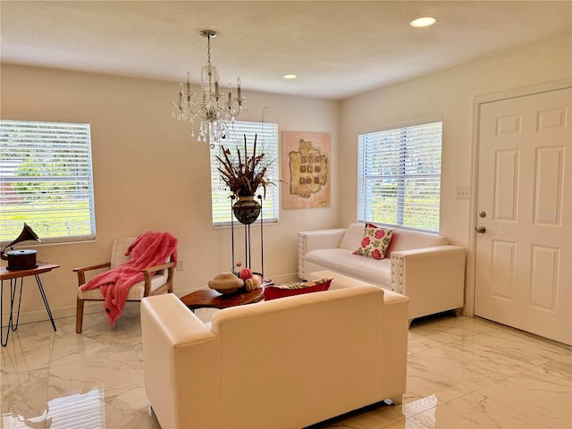 1302 W 8th St, Lakeland, FL 33805 - living room with light marble finish floors, a chandelier, healthy amount of natural light, and recessed lighting