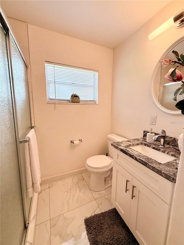 1302 W 8th St, Lakeland, FL 33805 - bathroom featuring marble finish flooring, a shower stall, and vanity