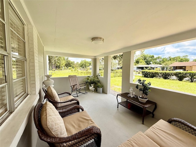 1302 W 8th St, Lakeland, FL 33805 - sunroom featuring concrete floors