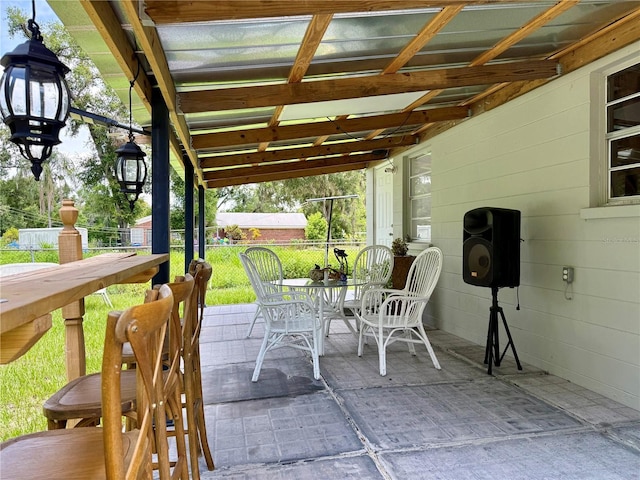 1302 W 8th St, Lakeland, FL 33805 - view of patio featuring outdoor dining area