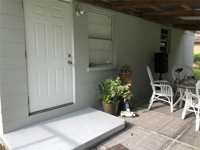 1302 W 8th St, Lakeland, FL 33805 - entrance to property with a patio area