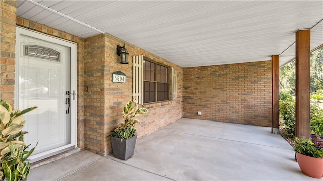 6504 Hereford Dr, Lakeland, FL 33810 - entrance to property with brick siding and covered porch
