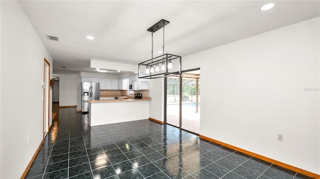 6504 Hereford Dr, Lakeland, FL 33810 - unfurnished living room featuring recessed lighting