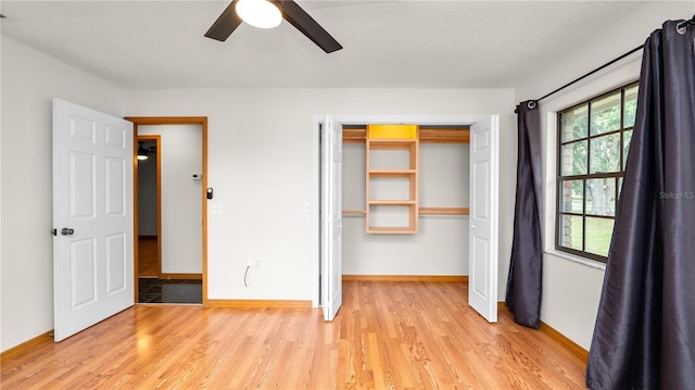 6504 Hereford Dr, Lakeland, FL 33810 - unfurnished bedroom featuring light wood-style floors, a closet, and a ceiling fan