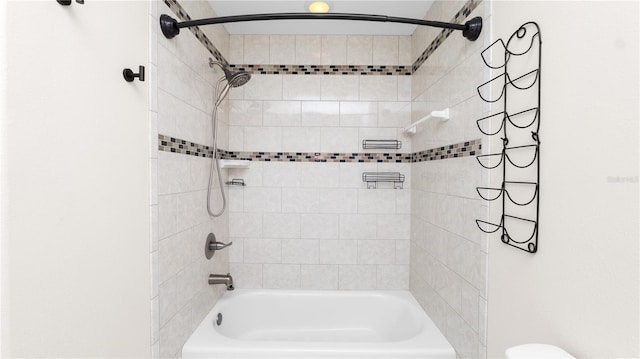 6504 Hereford Dr, Lakeland, FL 33810 - bathroom with tub / shower combination and toilet