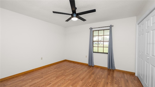 6504 Hereford Dr, Lakeland, FL 33810 - unfurnished bedroom with light wood-style floors, a closet, and ceiling fan