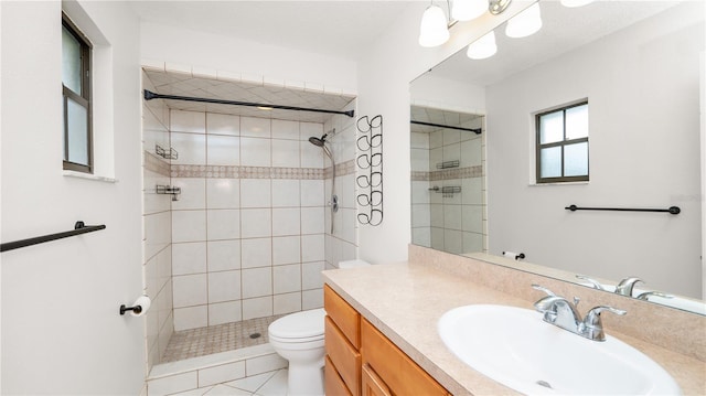6504 Hereford Dr, Lakeland, FL 33810 - full bathroom with vanity, a tile shower, and tile patterned flooring