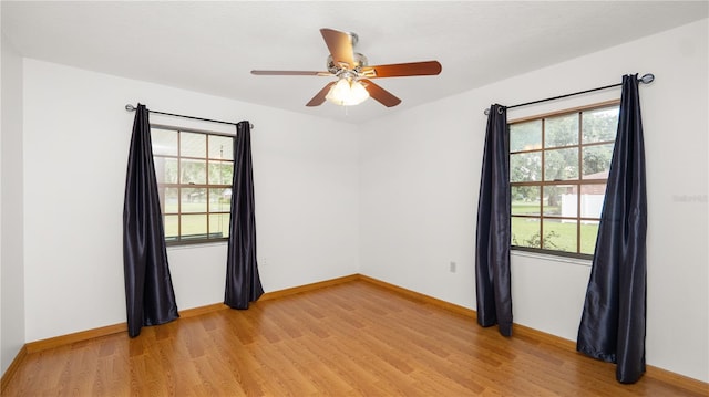 6504 Hereford Dr, Lakeland, FL 33810 - spare room featuring healthy amount of natural light, light wood-type flooring, and ceiling fan
