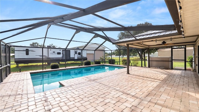 6504 Hereford Dr, Lakeland, FL 33810 - swimming pool featuring a lanai and a patio