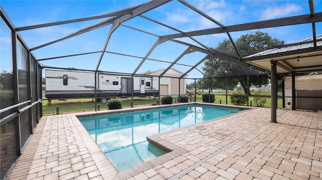 6504 Hereford Dr, Lakeland, FL 33810 - outdoor pool with a patio and glass enclosure