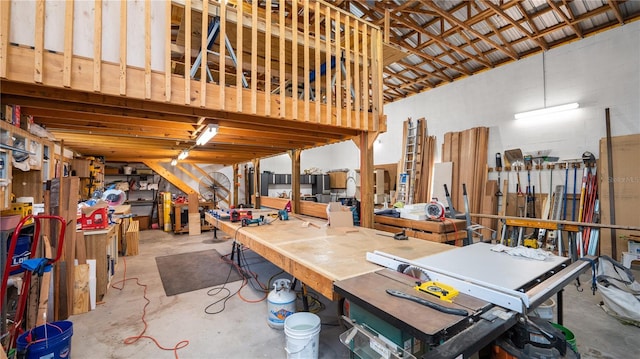 6504 Hereford Dr, Lakeland, FL 33810 - miscellaneous room featuring a workshop area and concrete floors