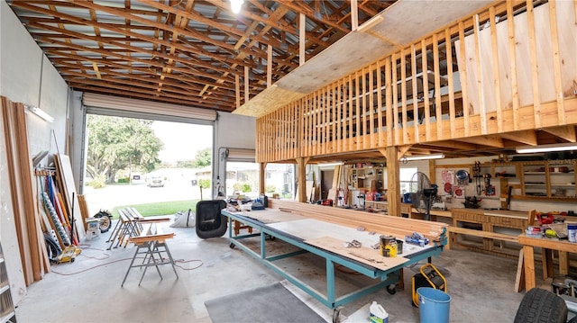 6504 Hereford Dr, Lakeland, FL 33810 - garage featuring a workshop area
