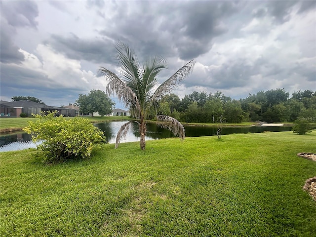 3999 Whistlewood Cir, Lakeland, FL 33811 - view of green lawn featuring a water view