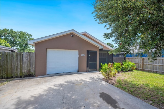 735 Virginia Ave, Auburndale, FL 33823 - ranch-style house featuring stucco siding, concrete driveway, and an attached garage