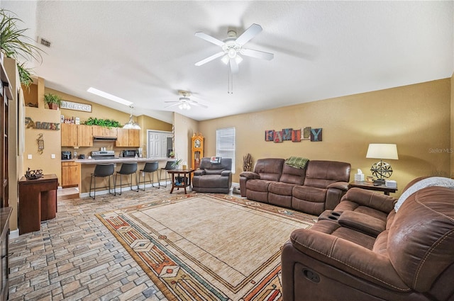 735 Virginia Ave, Auburndale, FL 33823 - living room with ceiling fan and vaulted ceiling