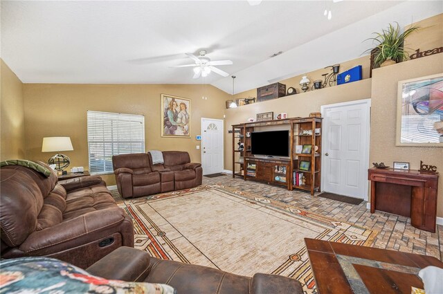 735 Virginia Ave, Auburndale, FL 33823 - living area with ceiling fan, vaulted ceiling, and plenty of natural light