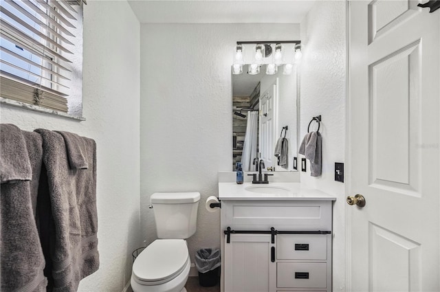 735 Virginia Ave, Auburndale, FL 33823 - bathroom featuring vanity and a textured wall