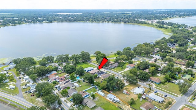 735 Virginia Ave, Auburndale, FL 33823 - aerial view of property and surrounding area with a large body of water and nearby suburban area