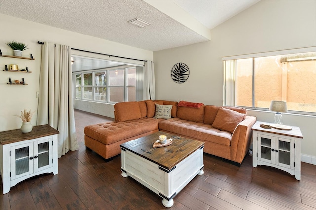 465 Las Cruces, Winter Haven, FL 33884 - living area with dark wood finished floors and a textured ceiling