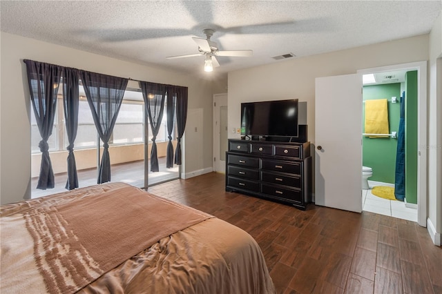 465 Las Cruces, Winter Haven, FL 33884 - bedroom with wood finish floors, ceiling fan, a textured ceiling, and ensuite bath