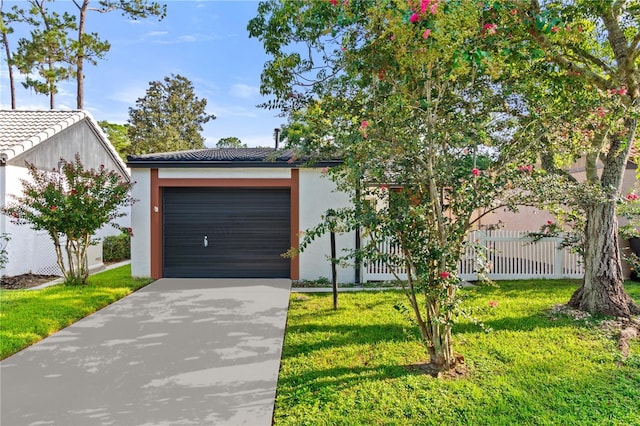 465 Las Cruces, Winter Haven, FL 33884 - view of front of property featuring concrete driveway, stucco siding, and an attached garage