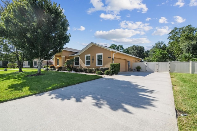 1933 Griffin Trl, Bartow, FL 33830 - ranch-style home featuring a gate, an attached garage, concrete driveway, and stucco siding
