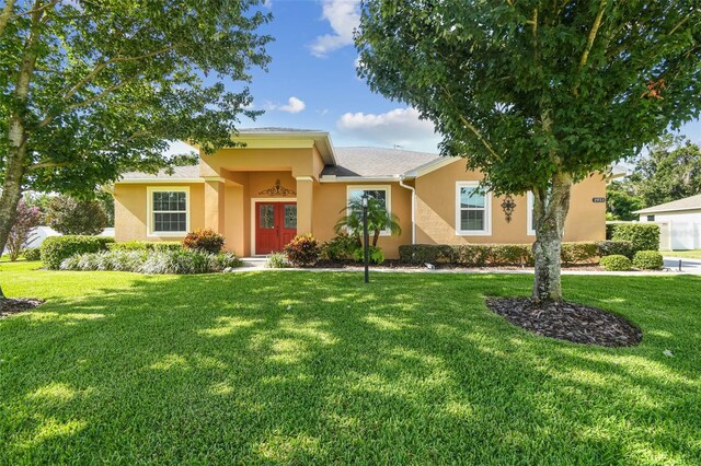 1933 Griffin Trl, Bartow, FL 33830 - view of front of property featuring stucco siding and a front yard
