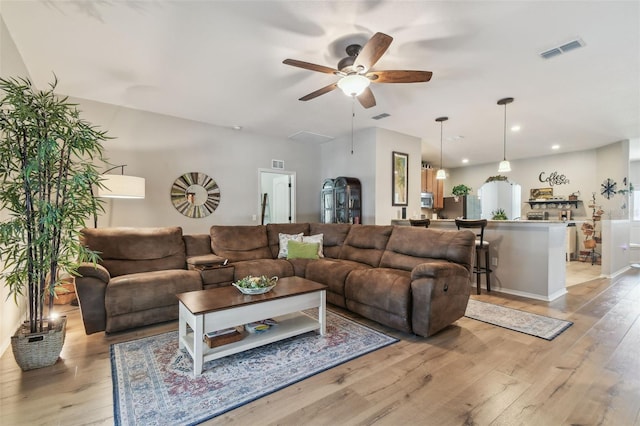 1933 Griffin Trl, Bartow, FL 33830 - living area with light wood-style flooring, ceiling fan, and recessed lighting