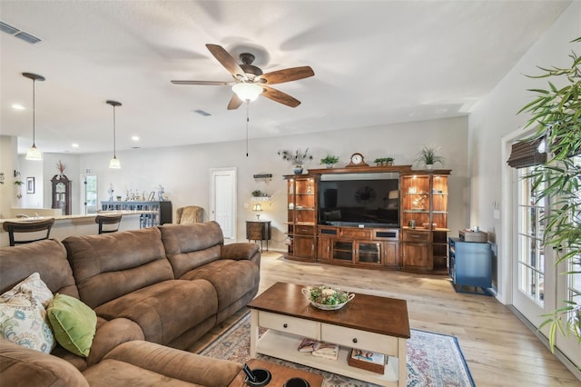 1933 Griffin Trl, Bartow, FL 33830 - living area featuring light wood-style floors, ceiling fan, and recessed lighting