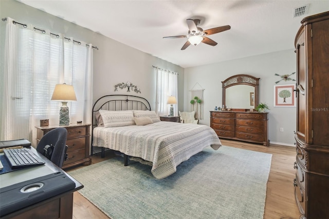 1933 Griffin Trl, Bartow, FL 33830 - bedroom featuring an office area, light wood-type flooring, and a ceiling fan