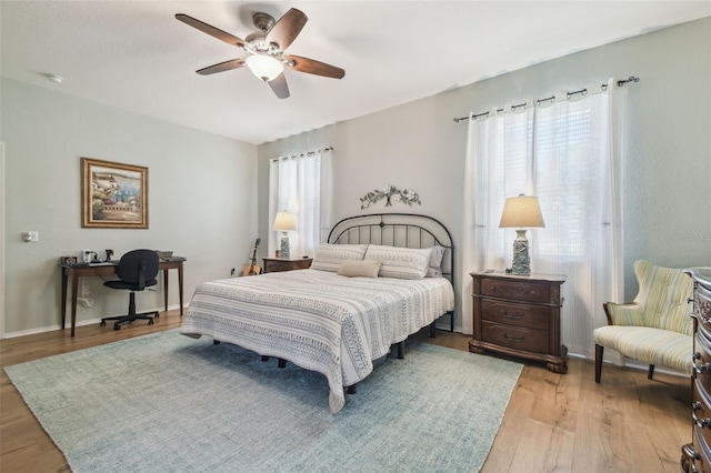 1933 Griffin Trl, Bartow, FL 33830 - bedroom featuring light wood-style floors, a desk, and a ceiling fan