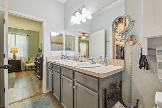 1933 Griffin Trl, Bartow, FL 33830 - bathroom with double vanity and a ceiling fan