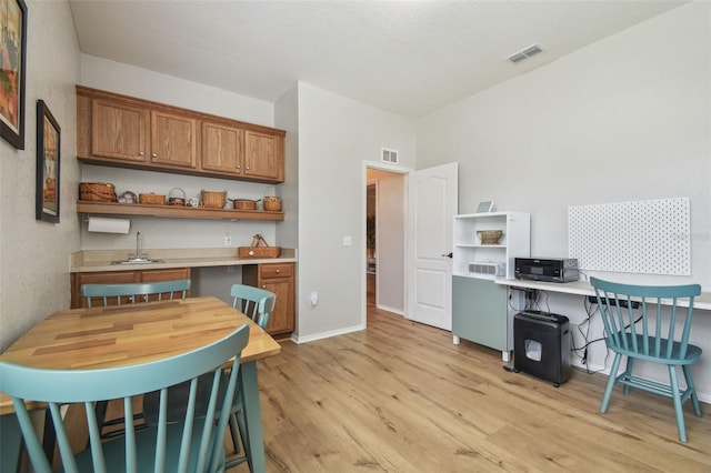 1933 Griffin Trl, Bartow, FL 33830 - dining room featuring light wood-style flooring and baseboards