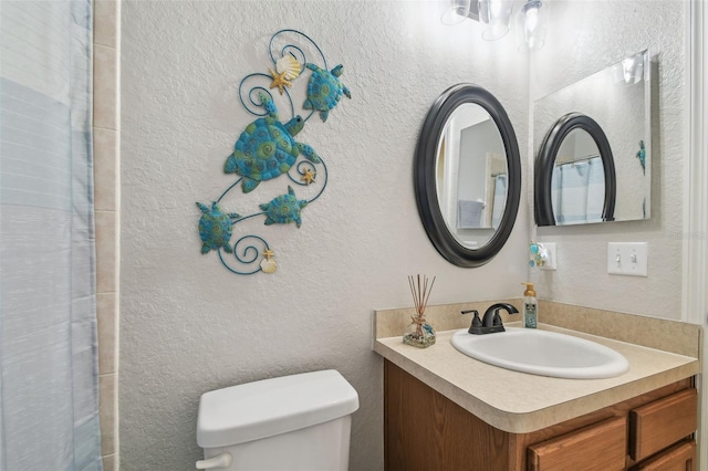 1933 Griffin Trl, Bartow, FL 33830 - bathroom with vanity, a textured wall, a chandelier, and a shower with shower curtain