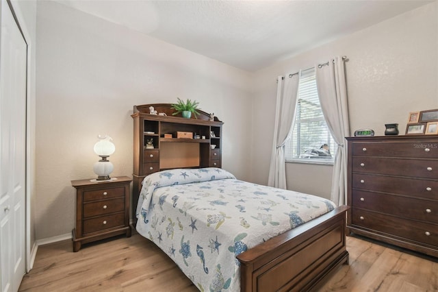 1933 Griffin Trl, Bartow, FL 33830 - bedroom featuring light wood-style floors and baseboards