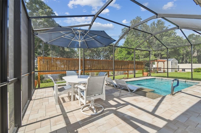 1933 Griffin Trl, Bartow, FL 33830 - view of swimming pool featuring a patio, a shed, outdoor dining space, and a lanai