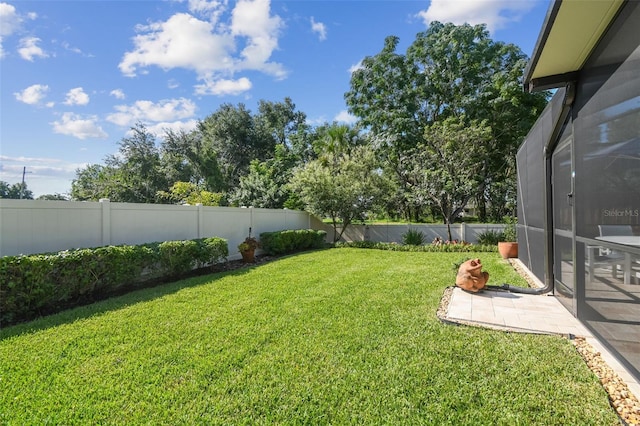 1933 Griffin Trl, Bartow, FL 33830 - fenced backyard featuring a patio and glass enclosure