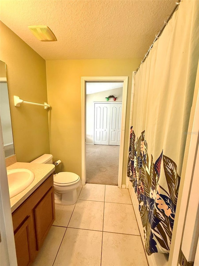 7198 Cedarcrest Blvd, Lakeland, FL 33810 - full bath featuring vanity, tile patterned floors, a textured ceiling, and curtained shower