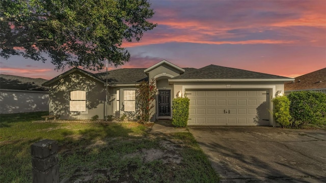 3917 NW Warbler Dr, Winter Haven, FL 33880 - single story home featuring driveway, stucco siding, and an attached garage