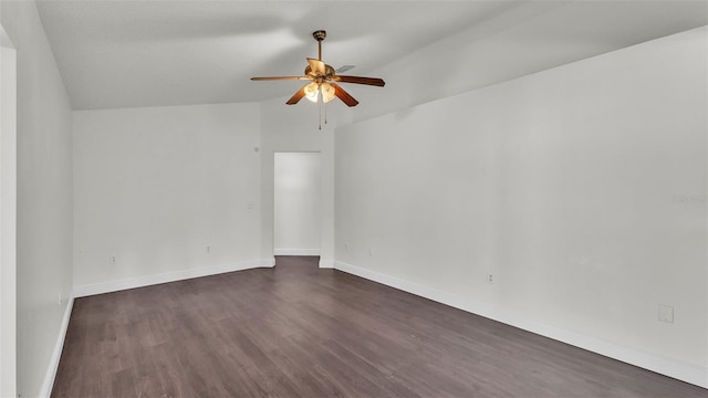 3917 NW Warbler Dr, Winter Haven, FL 33880 - empty room with lofted ceiling, ceiling fan, and dark wood-type flooring