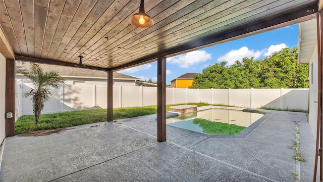 3917 NW Warbler Dr, Winter Haven, FL 33880 - fenced backyard with a patio area