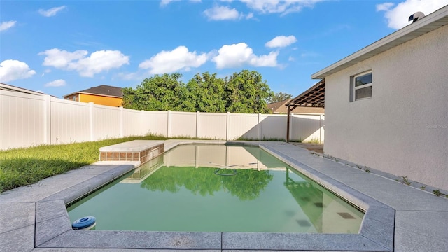 3917 NW Warbler Dr, Winter Haven, FL 33880 - view of pool featuring a fenced backyard