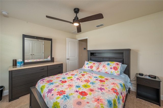 702 Country Walk Cv, Eagle Lake, FL 33839 - bedroom with light carpet and ceiling fan