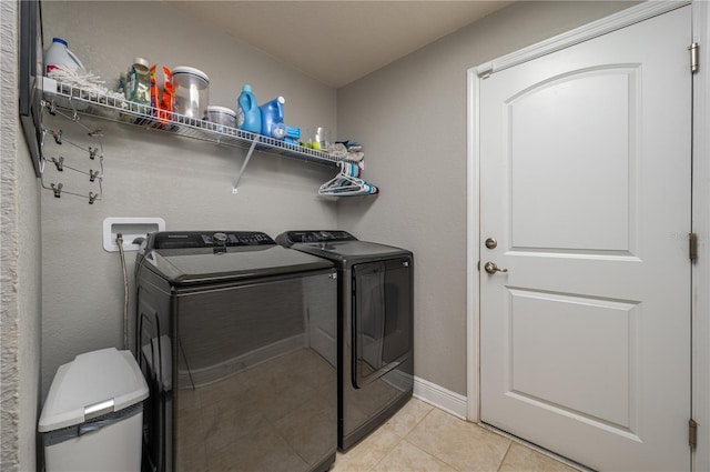 702 Country Walk Cv, Eagle Lake, FL 33839 - washroom with washing machine and dryer and light tile patterned flooring